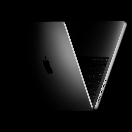 MacBook Pro positioned into the shape of a V, referencing the M5 chip
