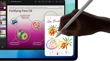 iPad Pro, front exterior display with dark blue and green gradient background with multiple apps open, hand holding Apple Pencil Pro circling a sketch showing Apple Intelligence Image Wand feature