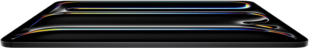 iPad Pro, front exterior, space black color, aluminum and glass enclosure, thin profile, tilted back with display showing multicolored line art