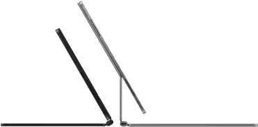2 iPad Pro devices attached to Magic Keyboard, side exterior, thin profile, space black color with speakers and USB-C port, tilted half open, silver color, open, tilted back showing the keyboard’s floating cantilever design, speakers and microphone